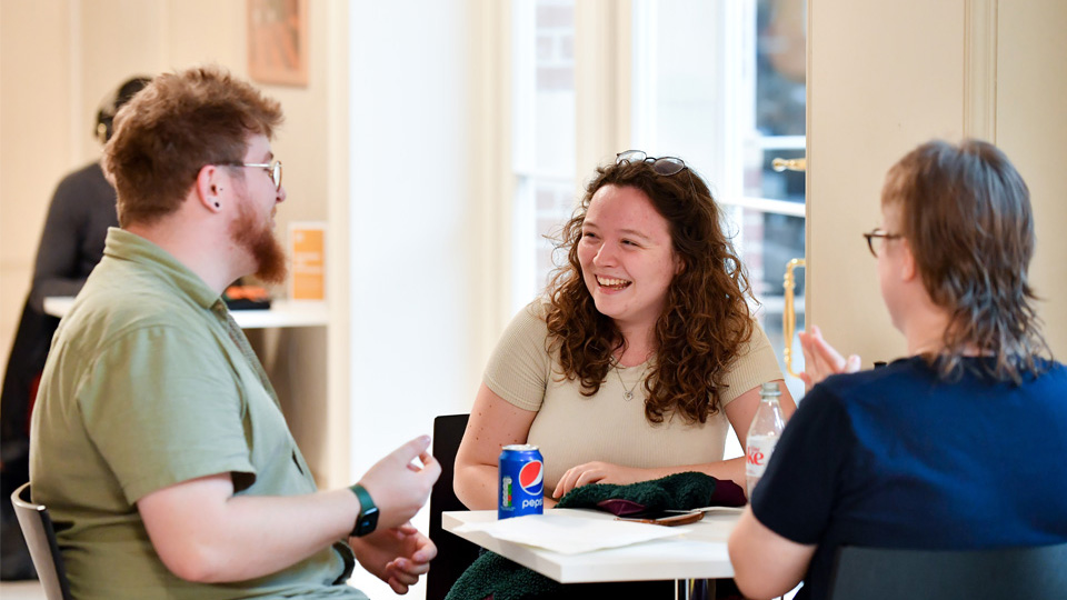 Student chatting in cafe